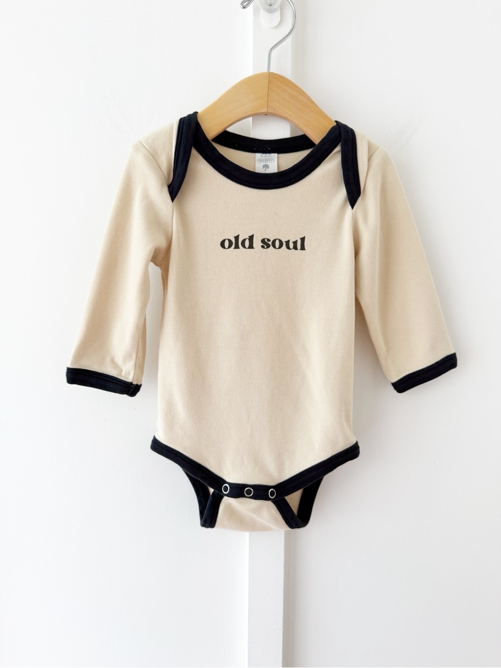 KATE QUINN cream old soul onesie